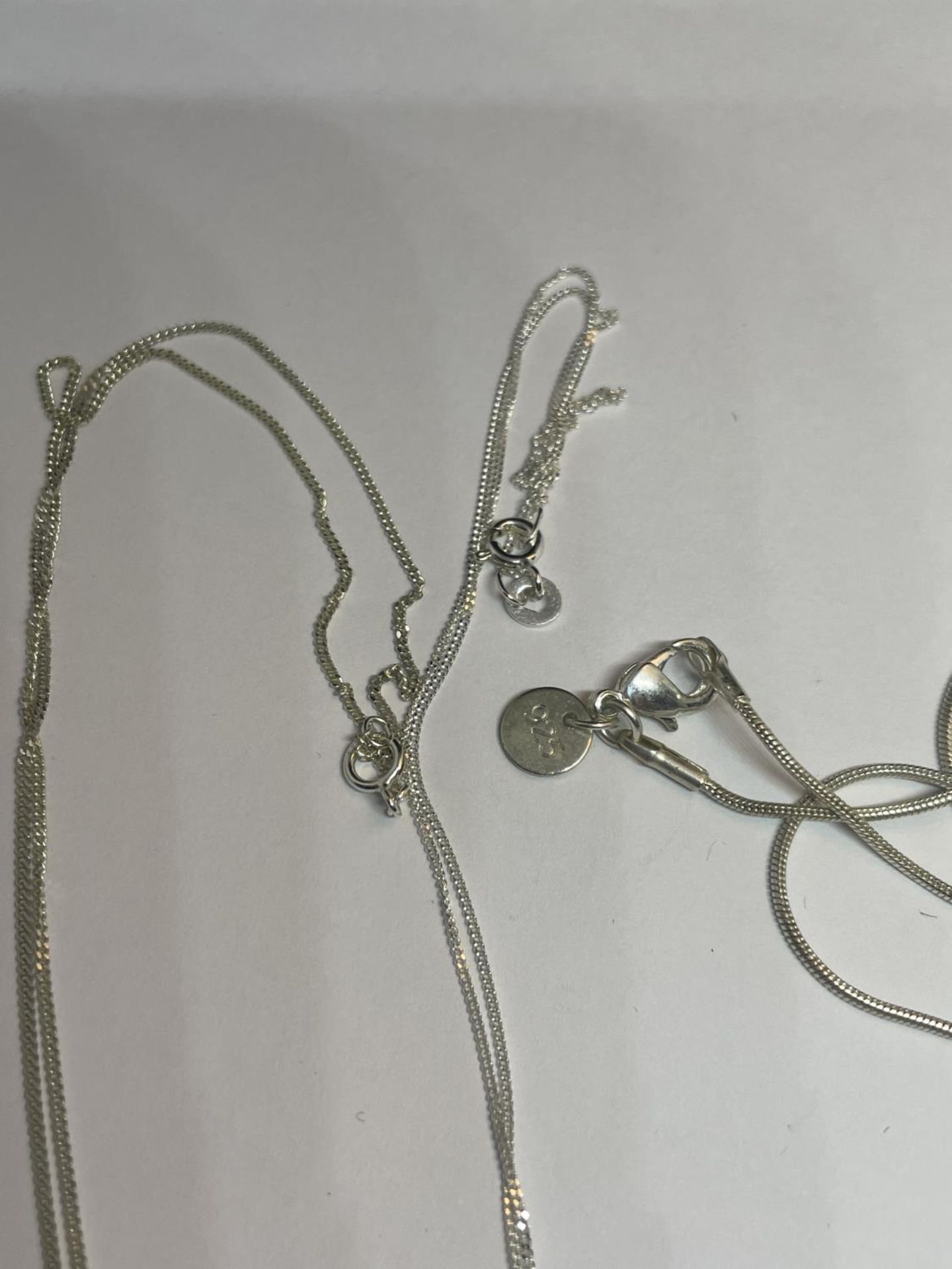 THREE SILVER NECKLACES WITH CROSS PENDANTS - Image 3 of 3