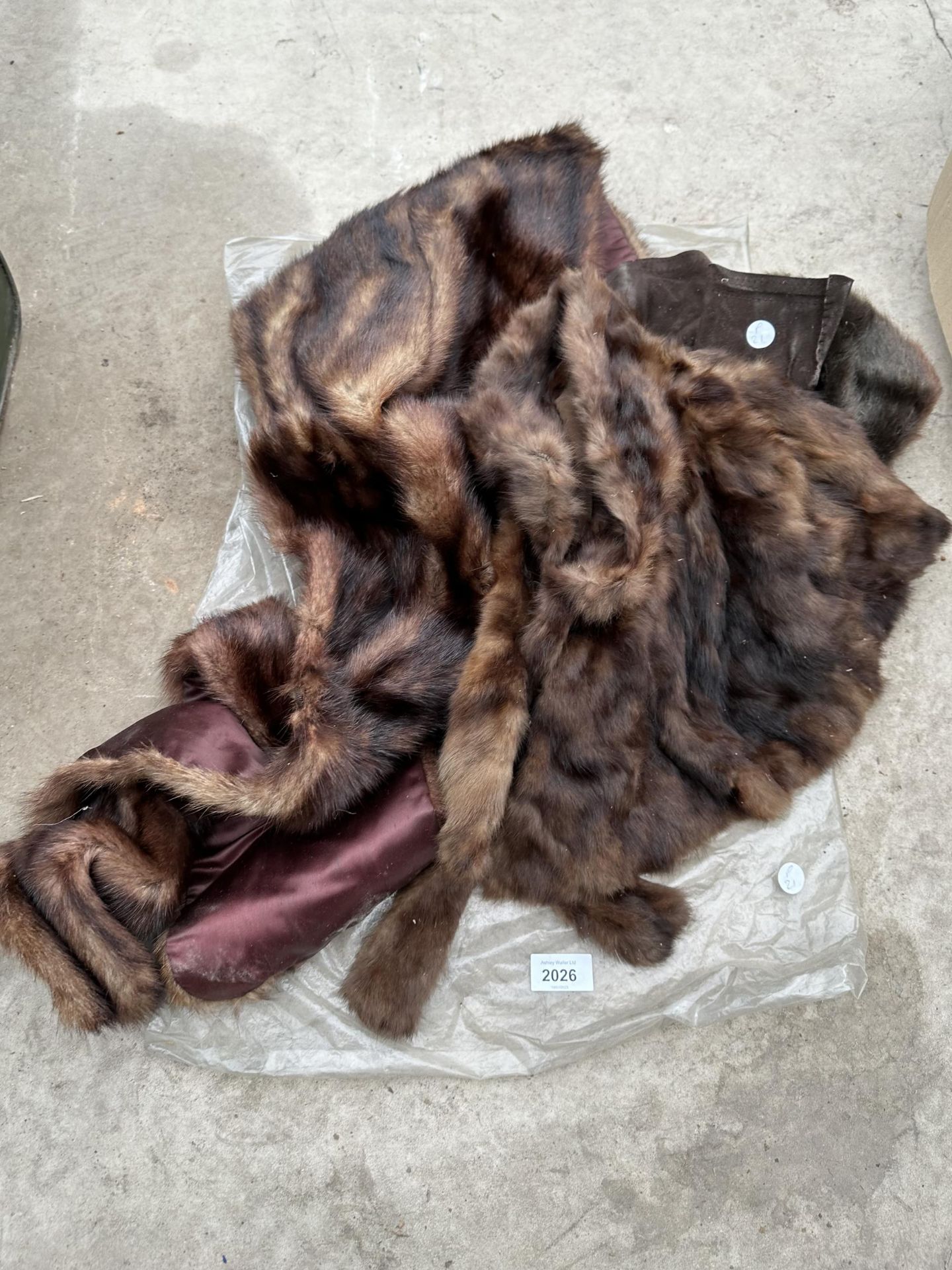 AN ASSORTMENT OF FUR STOLES