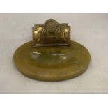 AN ONYX ASHTRAY WITH A BRASS PLAQUE ' EVENING CHRONICLE AWARD'