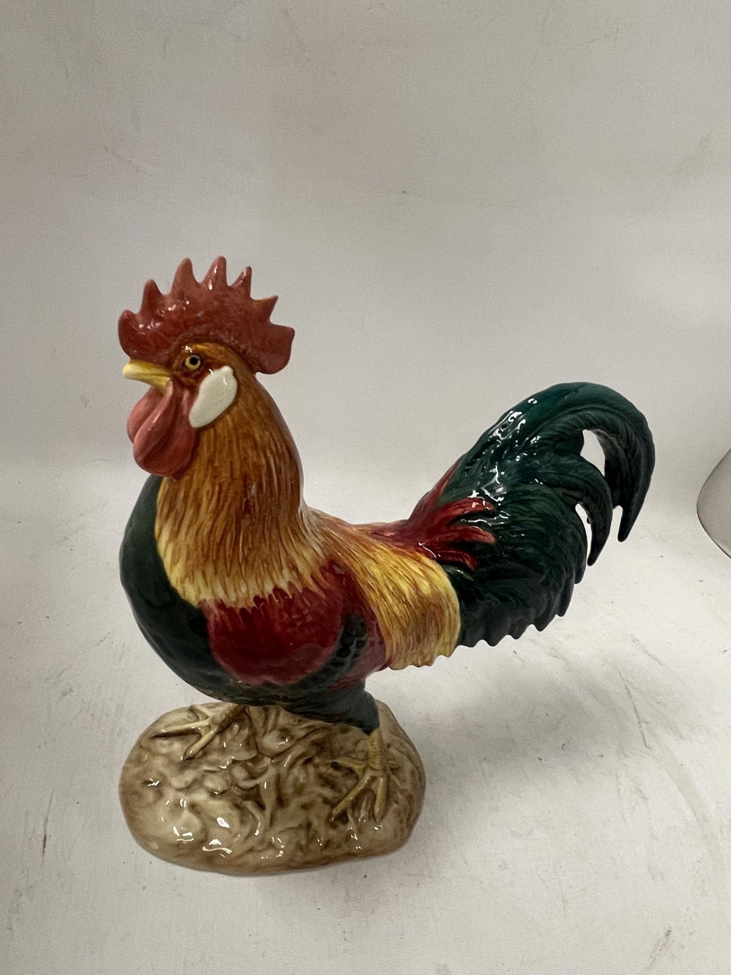 A BESWICK NO. 1892 LEGHORN FIGURE