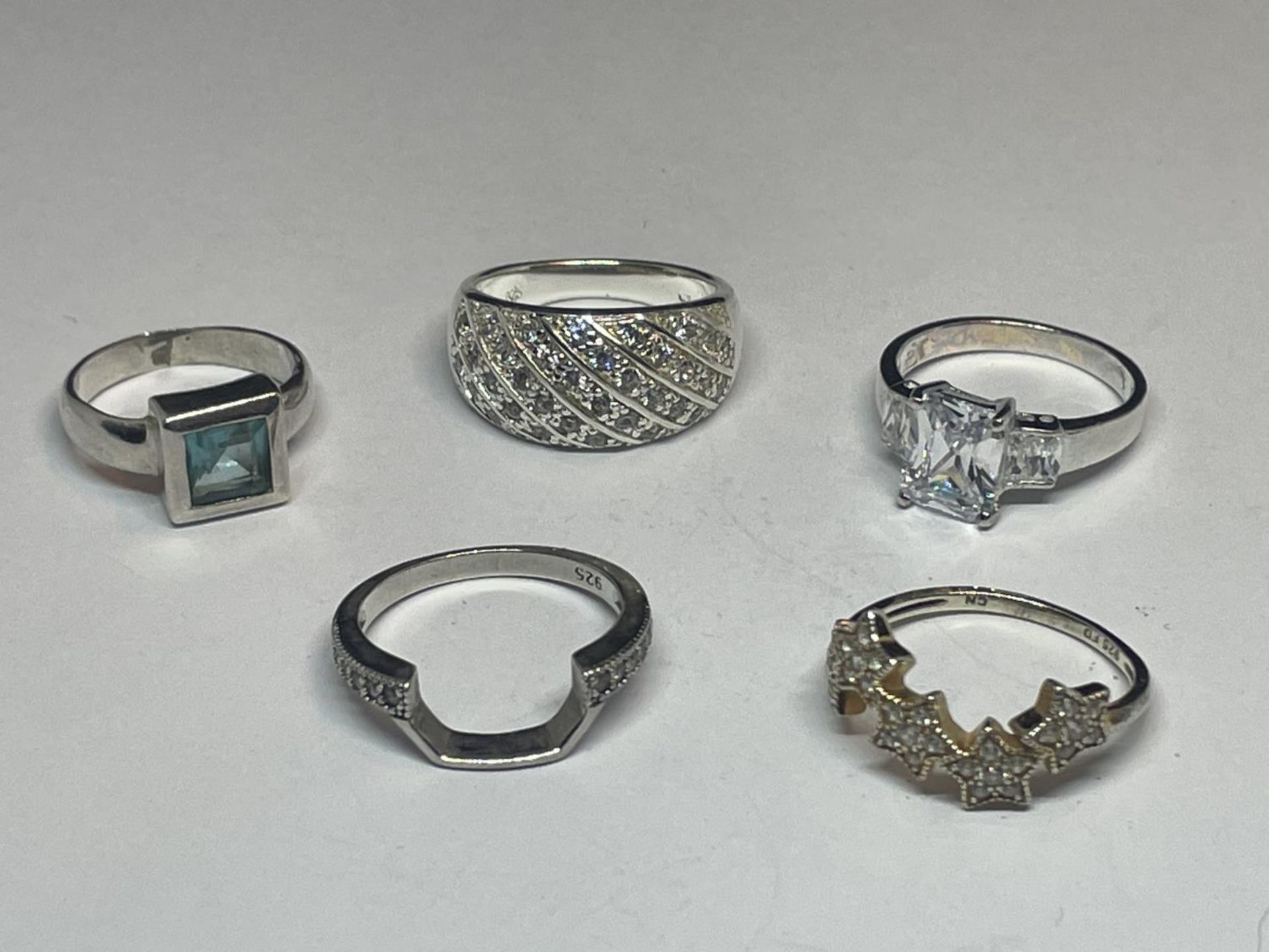 FIVE VARIOUS SILVER RINGS