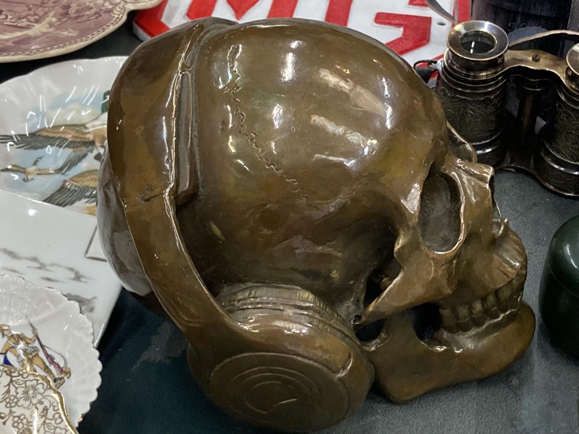 A BRONZE SKULL WITH HEADPHONES - Image 2 of 3