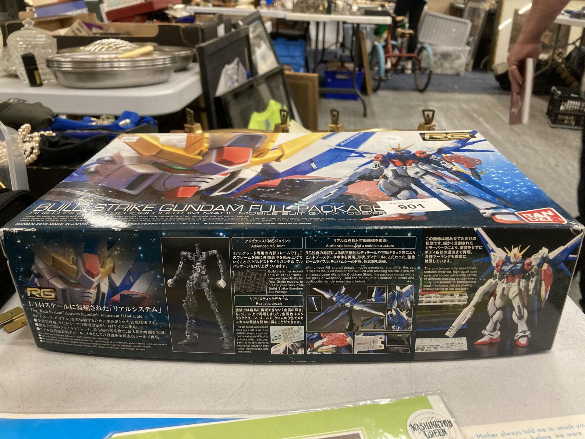 A BANDAI BUILD STRIKE GUNDAM FULL PACKAGE - PART BUILT, PART ON SPRUES