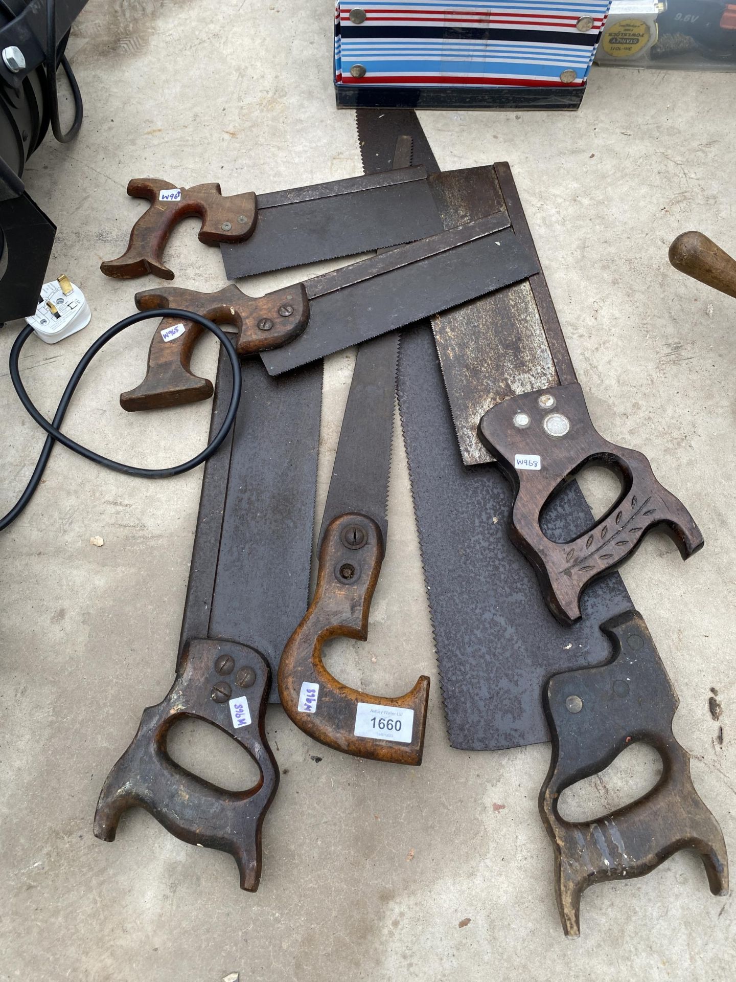 AN ASSORTMENT OF VINTAGE HAND SAWS
