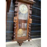 A VICTORIAN WALNUT 8 DAY WALL CLOCK WITH ROMAN NUMERALS AND TWO WEIGHTS