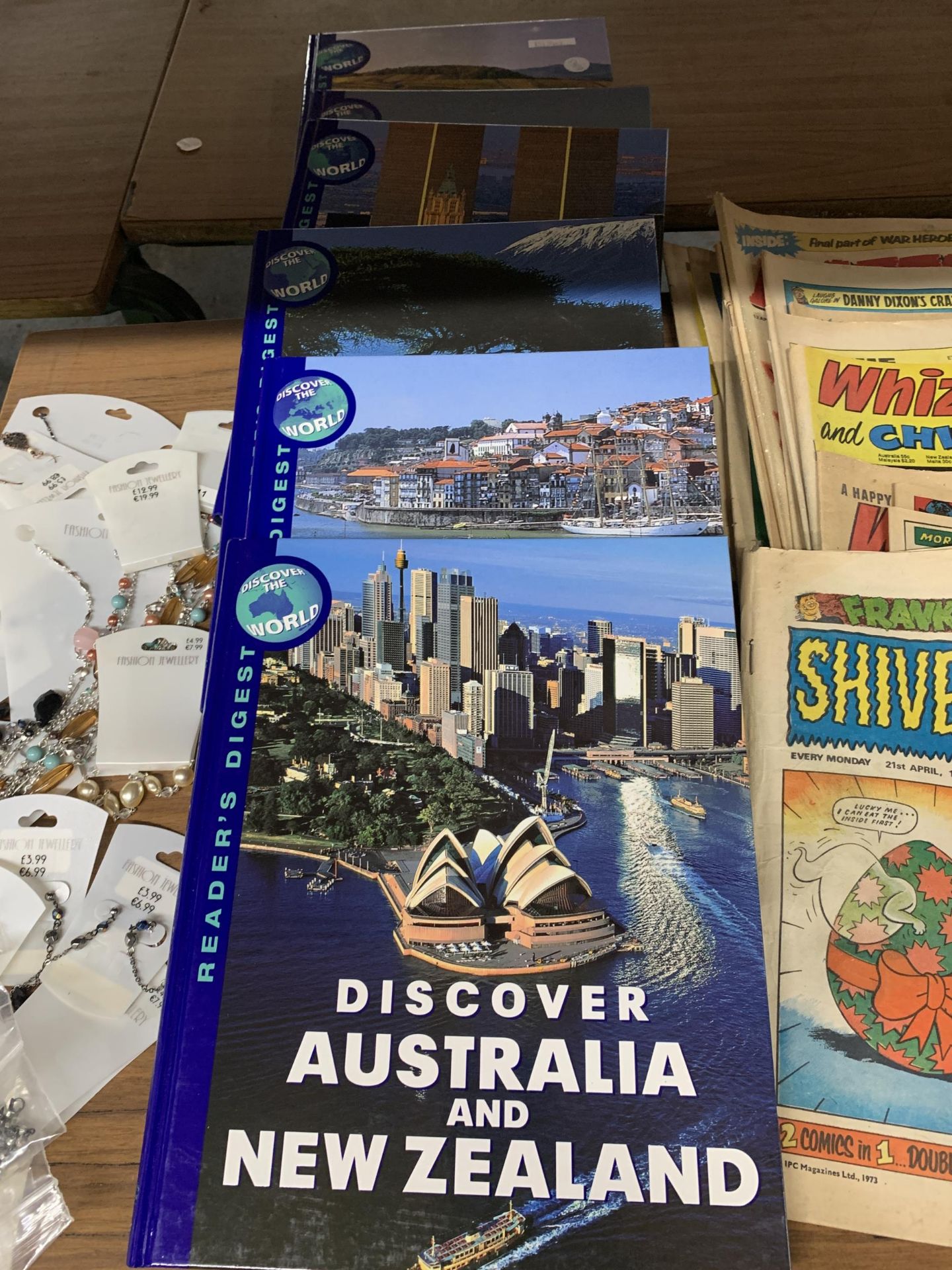 A SET OF READER'S DIGEST "DISCOVER THE WORLD" HARDBACK BOOKS