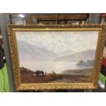 A LARGE GILT FRAMED PRINT OF A SHEEPDOG ROUNDING UP SHEEP IN A LAKELAND SETTING