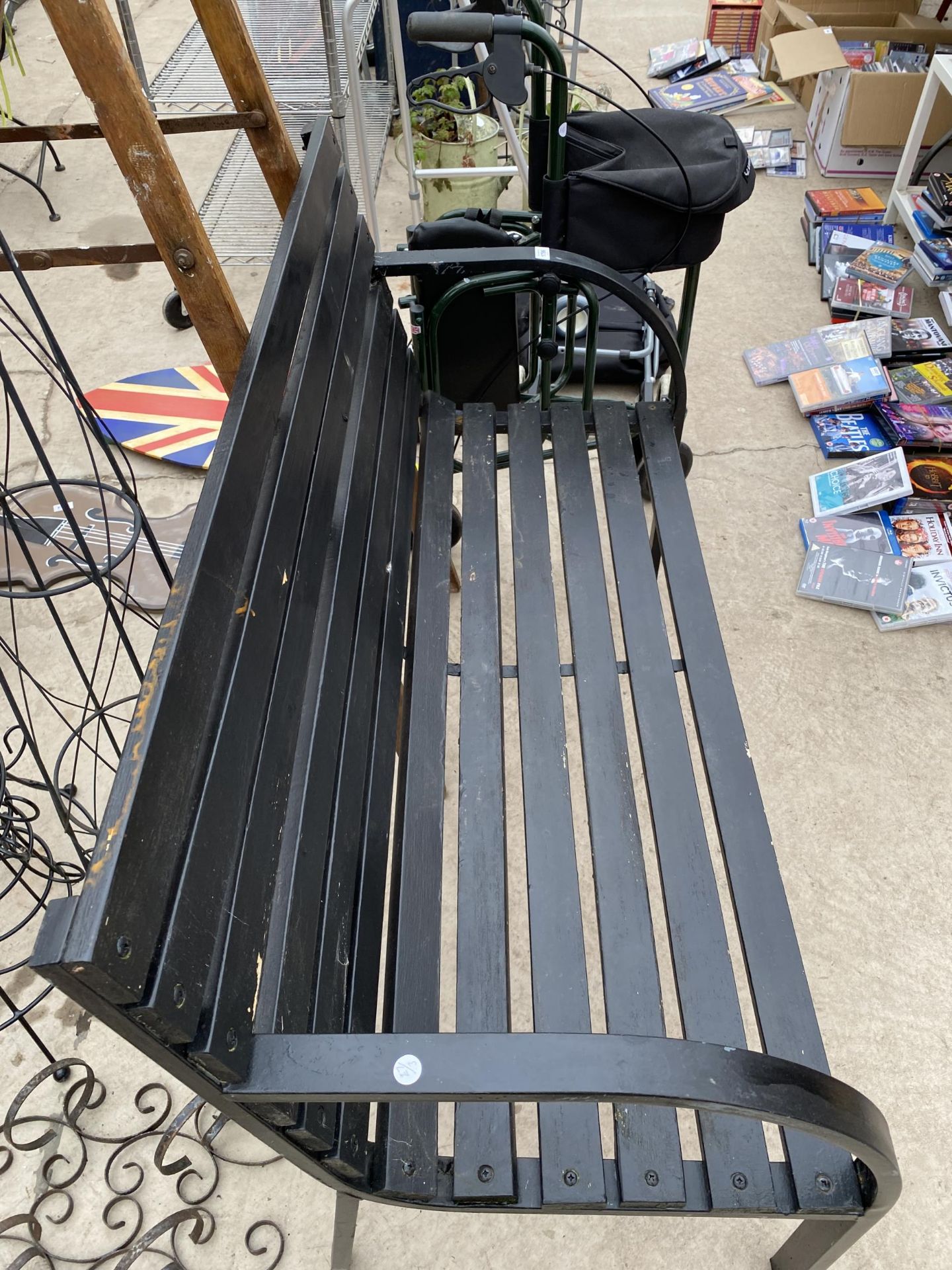 A WOODEN SLATTED GARDEN BENCH WITH METAL ENDS - Image 2 of 2
