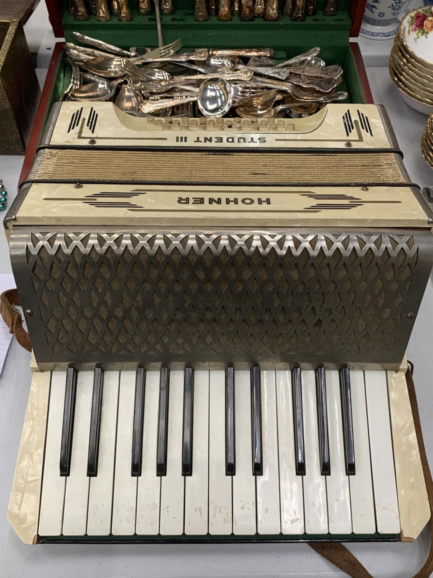 A HOHNER STUDENT III ACCORDIAN