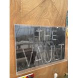 A LARGE ILLUMINATED 'THE VAULT' SIGN