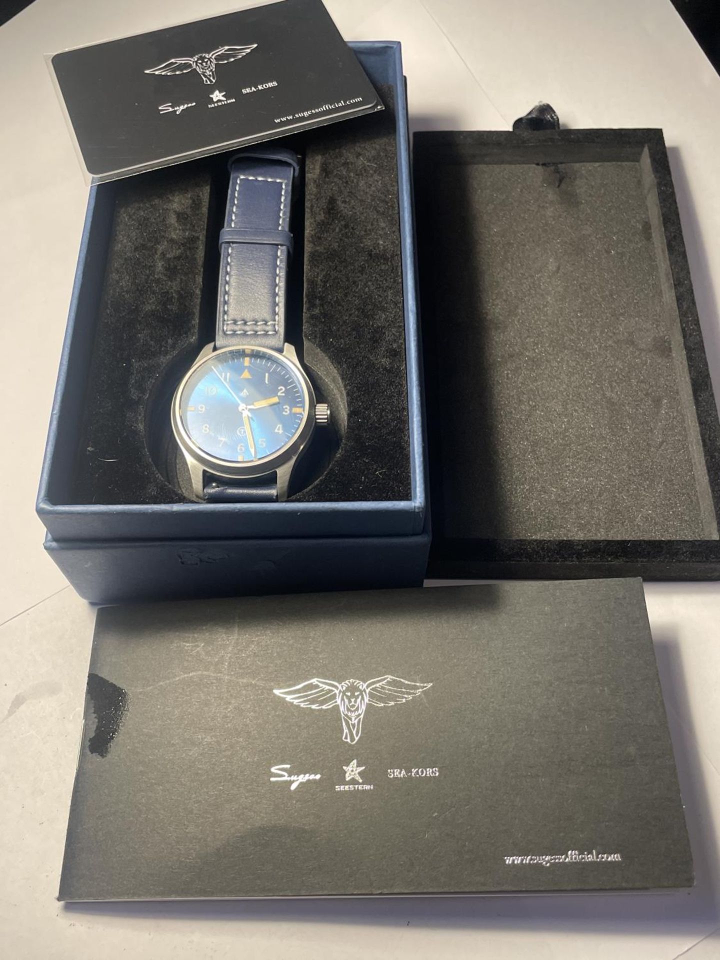 AN AS NEW AND BOXED MILITARY WRIST WATCH SEEN WORKING BUT NO WARRANTY