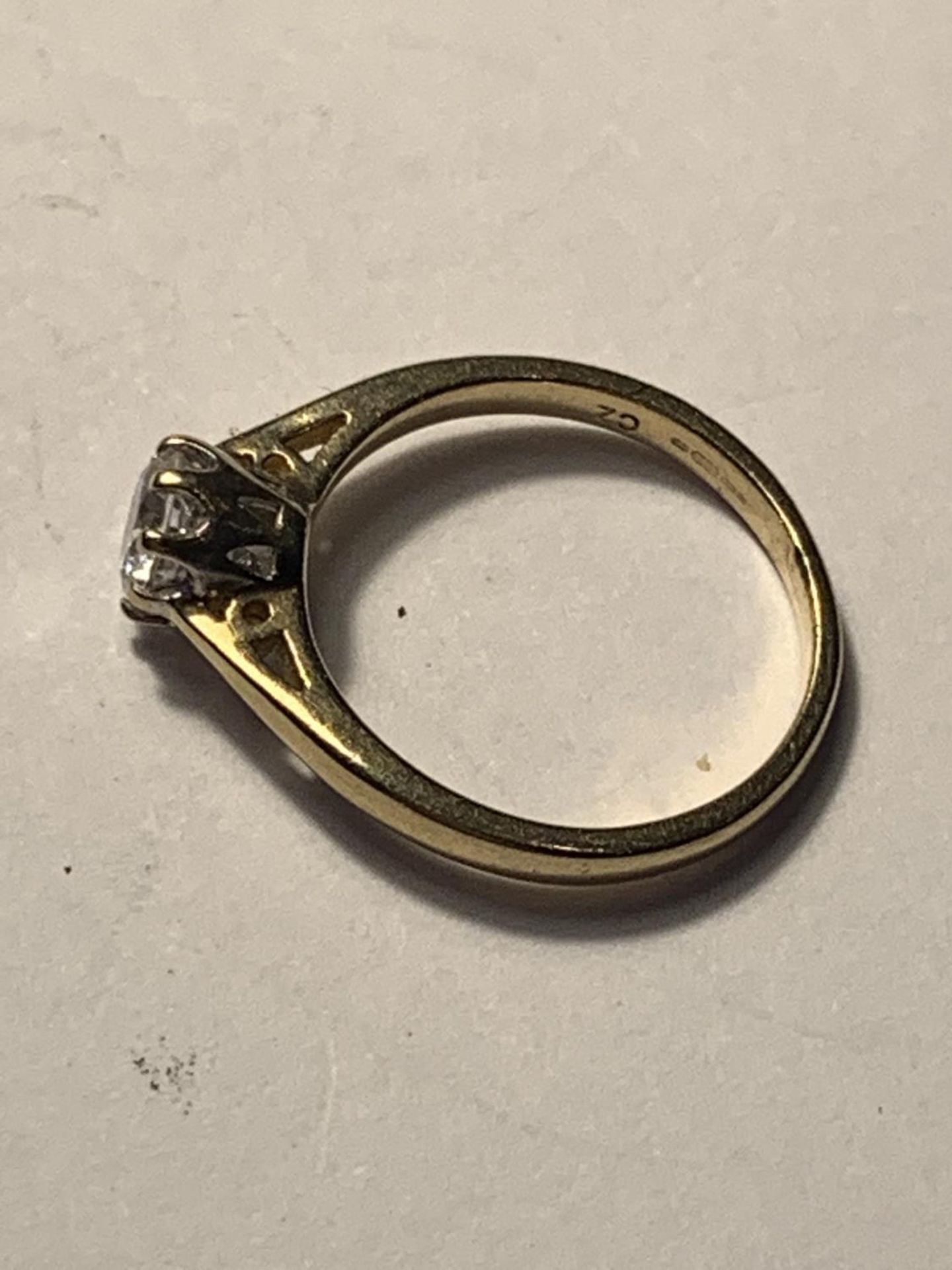 A 9 CARAT GOLD RING WITH A SOLITAIRE CUBIC ZIRCONIA SIZE J/K - Image 2 of 3