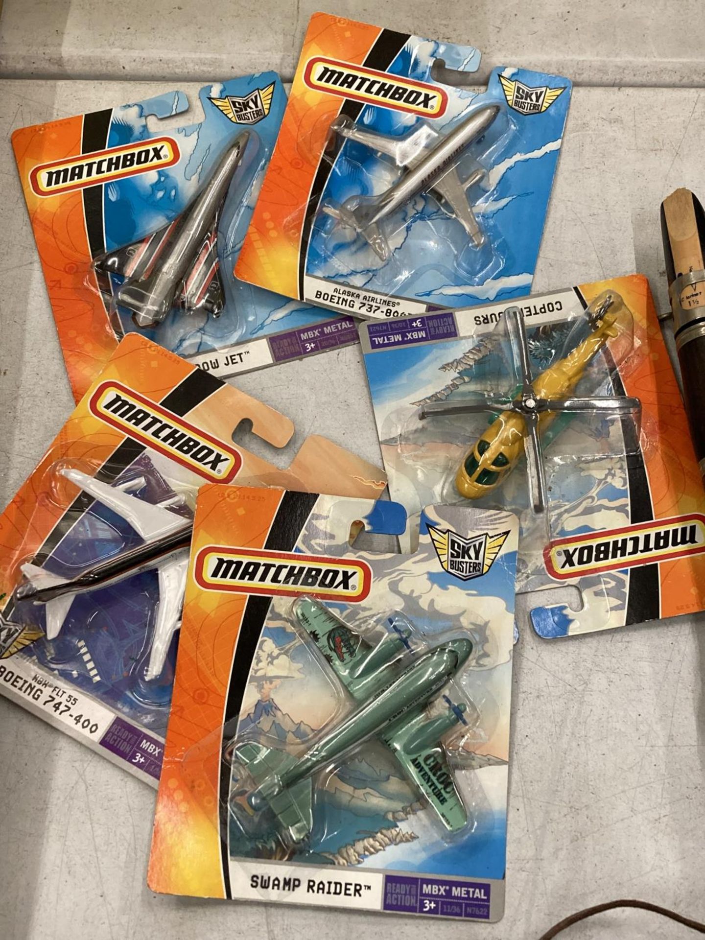 FIVE METAL MATCHBOX NEW AND SEALED SKYBUSTERS