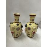 A PAIR OF CONTINENTAL PORCELAIN VASES IN THE ZSOLNAY PECS STYLE, UNMARKED