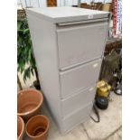 A FOUR DRAWER METAL FILING CABINET