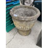 A RECONSTITUTED STONE GARDEN PLANTER