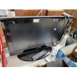 A SAMSUNG 22" TELEVISION WITH REMOTE CONTROL