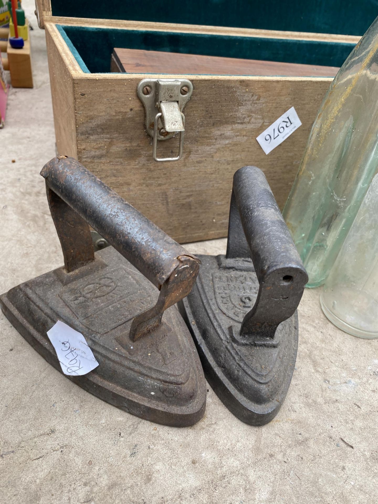 TWO WOODEN STORAGE BOXES, AN ASSORTMENT OF GLASS BOTTLES AND TWO FLAT IRONS - Image 3 of 4