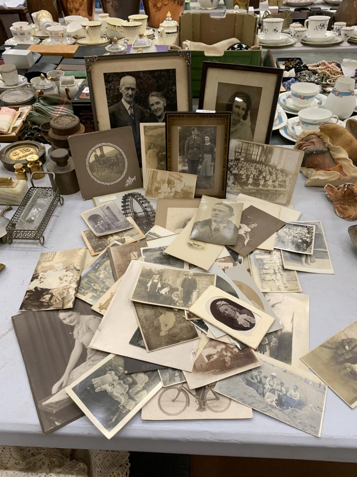 A COLLECTION OF VINTAGE SEPIA PHOTOGRAPHS, SOME IN FRAMES