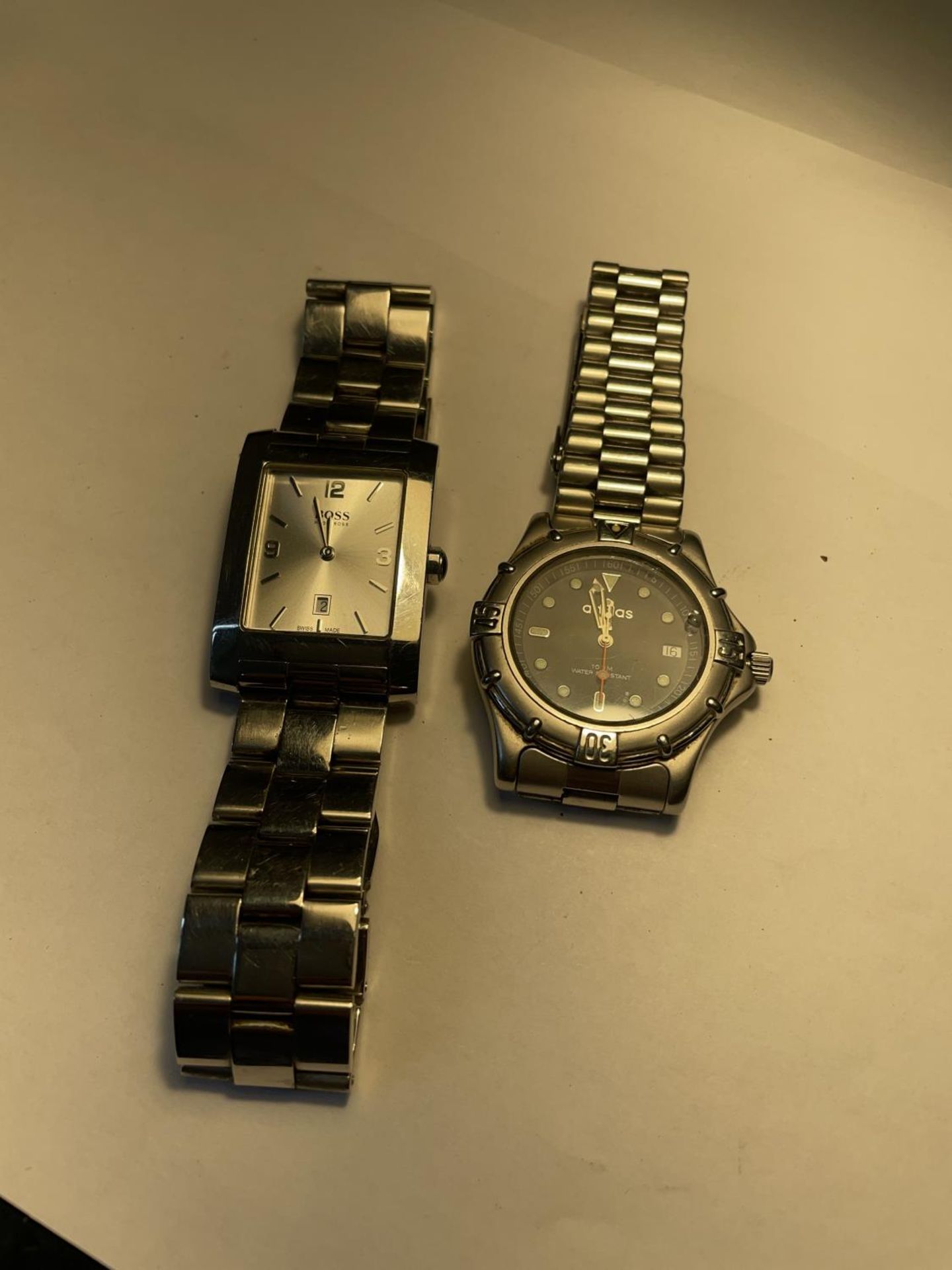 TWO WATCHES TO INCLUDE A BOSS AND ADIDAS