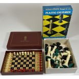 TWO CHESS SETS - BOXED PLASTIC CHESSMEN AND T.S.L TRAVELLING SET, BOTH COMPLETE