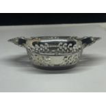 A DECORATIVE STERLING SILVER DISH WITH PIERCED SIDES