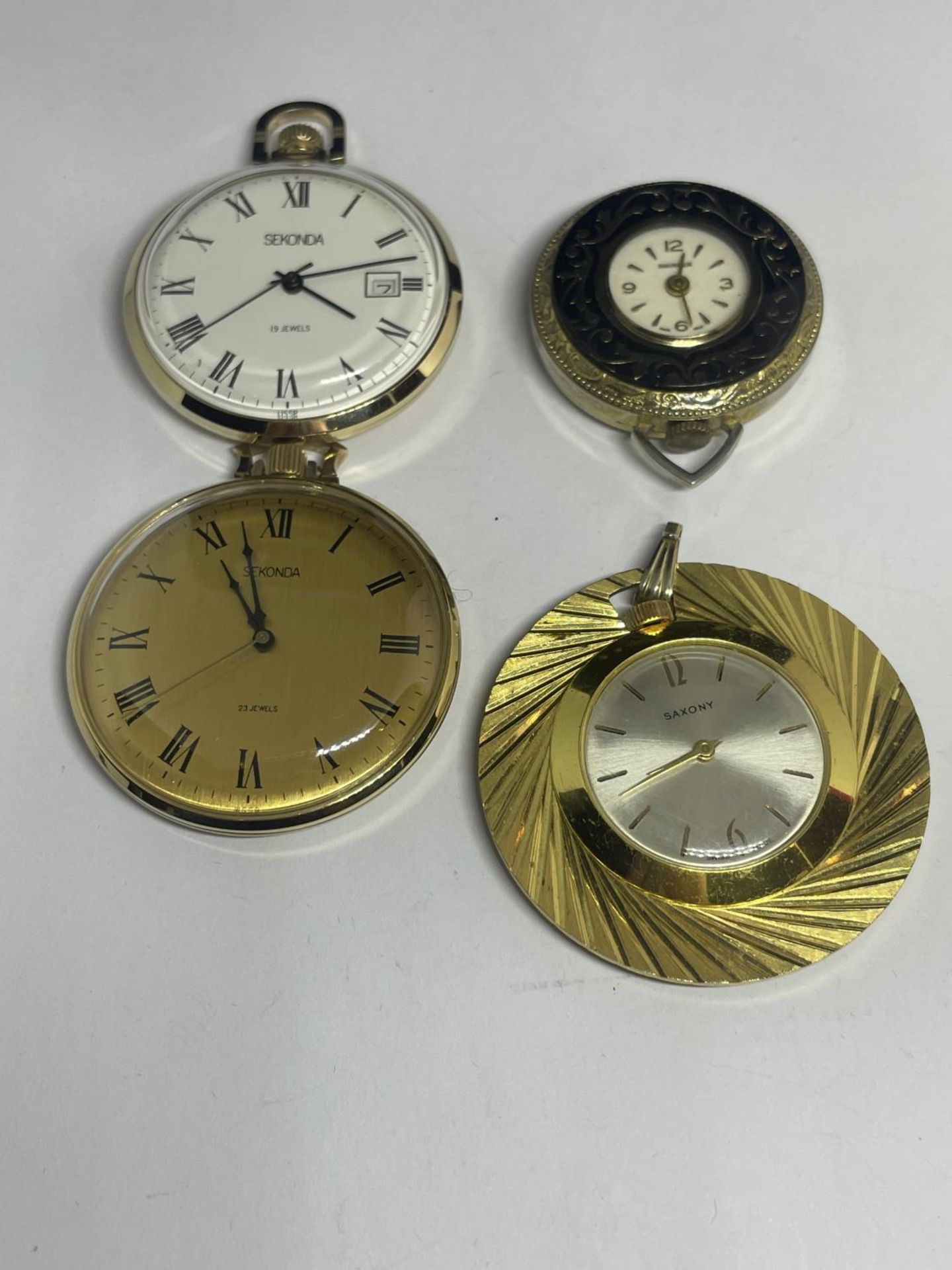FOUR VARIOUS POCKET AND PENDANT WATCHES TWO SEKONDA SEEN WORKING BUT NO WARRANTY