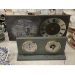 A SLATE MANTLE CLOCK WITH A SHEPHERD AND SHEEPDOG IMAGE AND A SLATE BAROMETER AND HYGROMETER