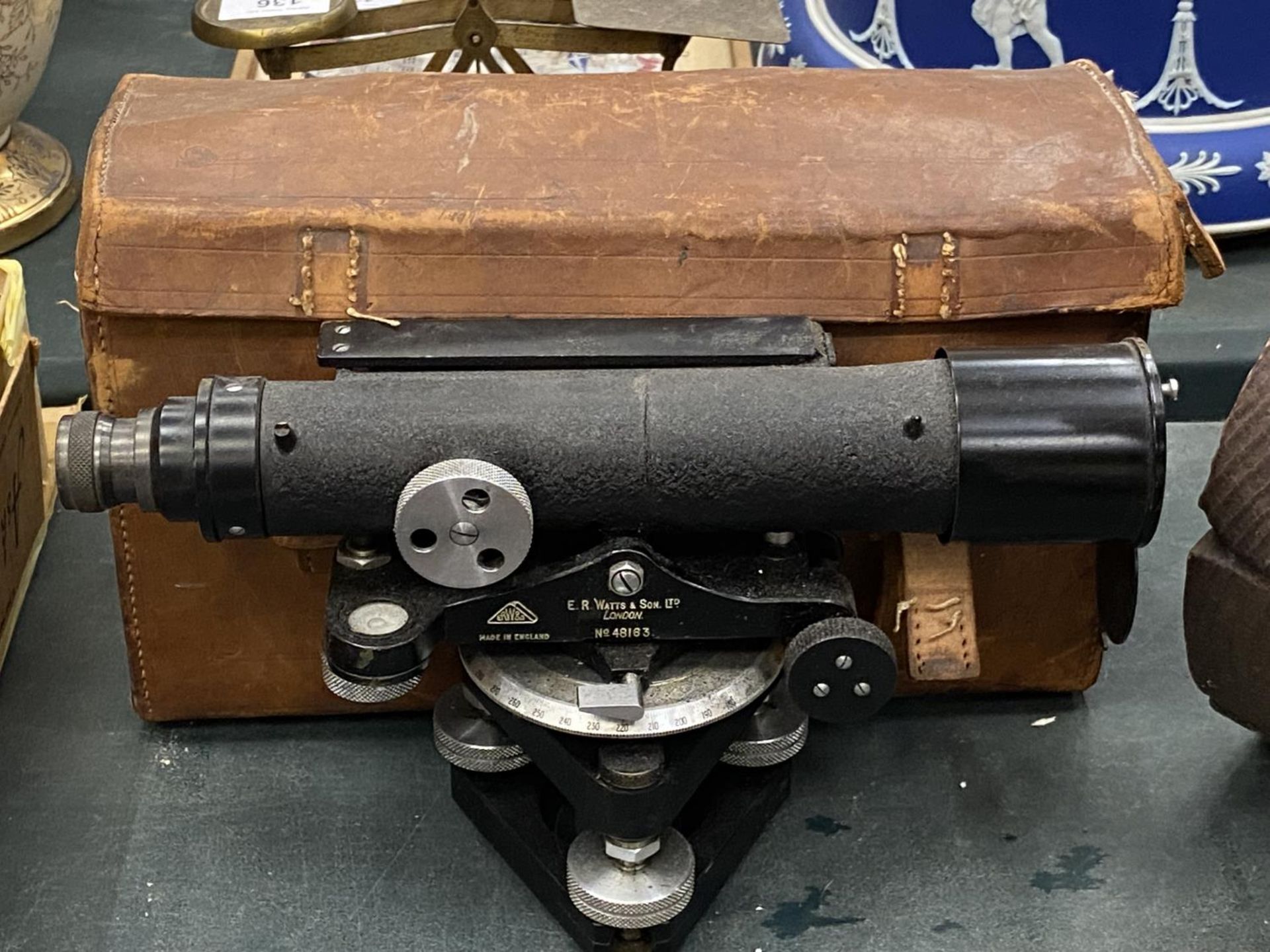 A THEODOLITE BY E.R. WATTS & SON IN LEATHER CASE - SERIAL NUMBER 48183