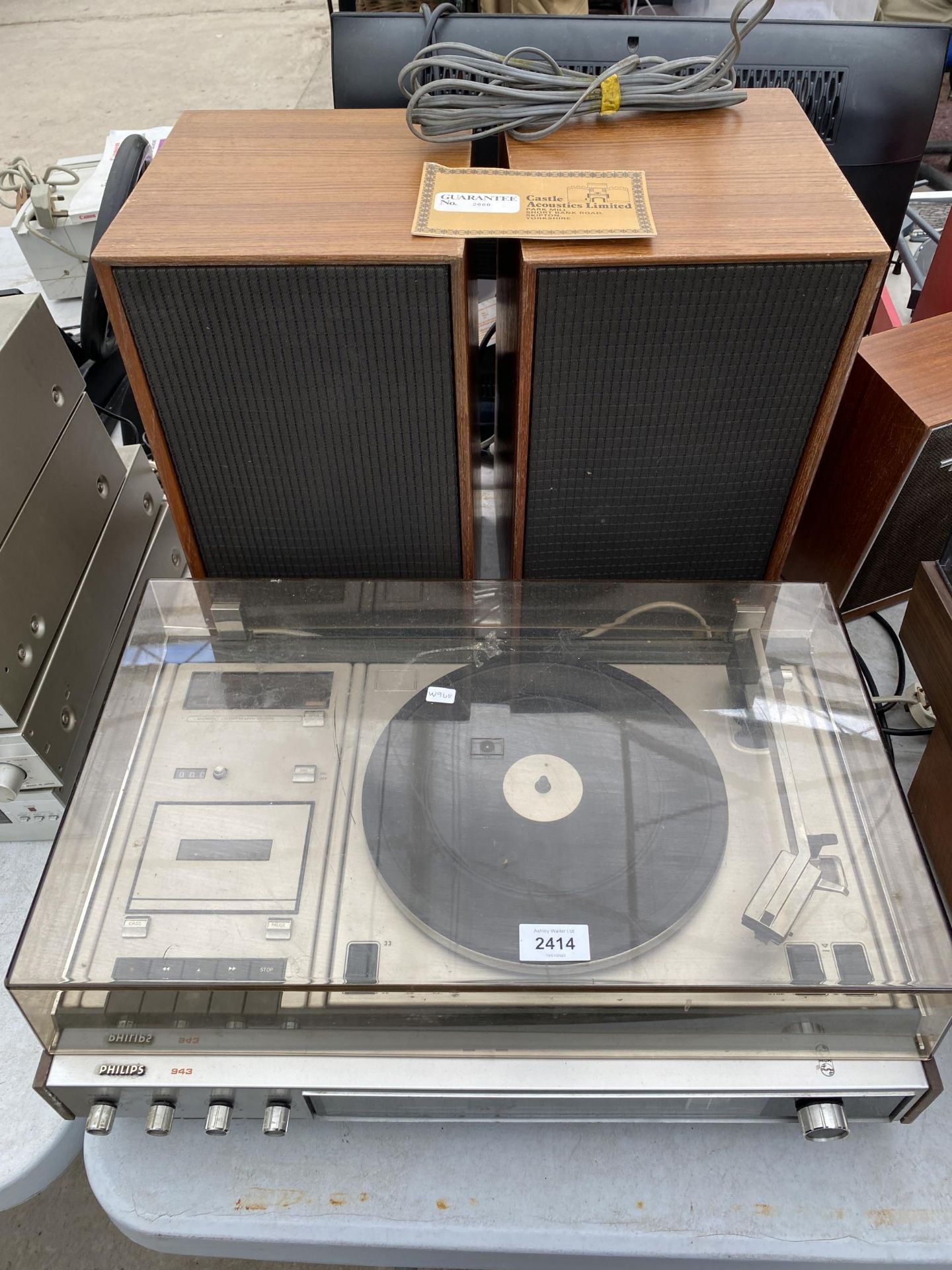 A RETRO PHILIPS RECORD PLAYER AND A PAIR OF WOODEN CASED SPEAKERS