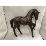 A LARGE VINTAGE LEATHER MODEL OF A HORSE