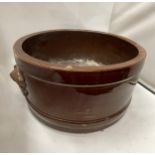 A LARGE VINTAGE BROWN TREACLE GLAZE STONEWARE BOWL, DIAMETER 39CM