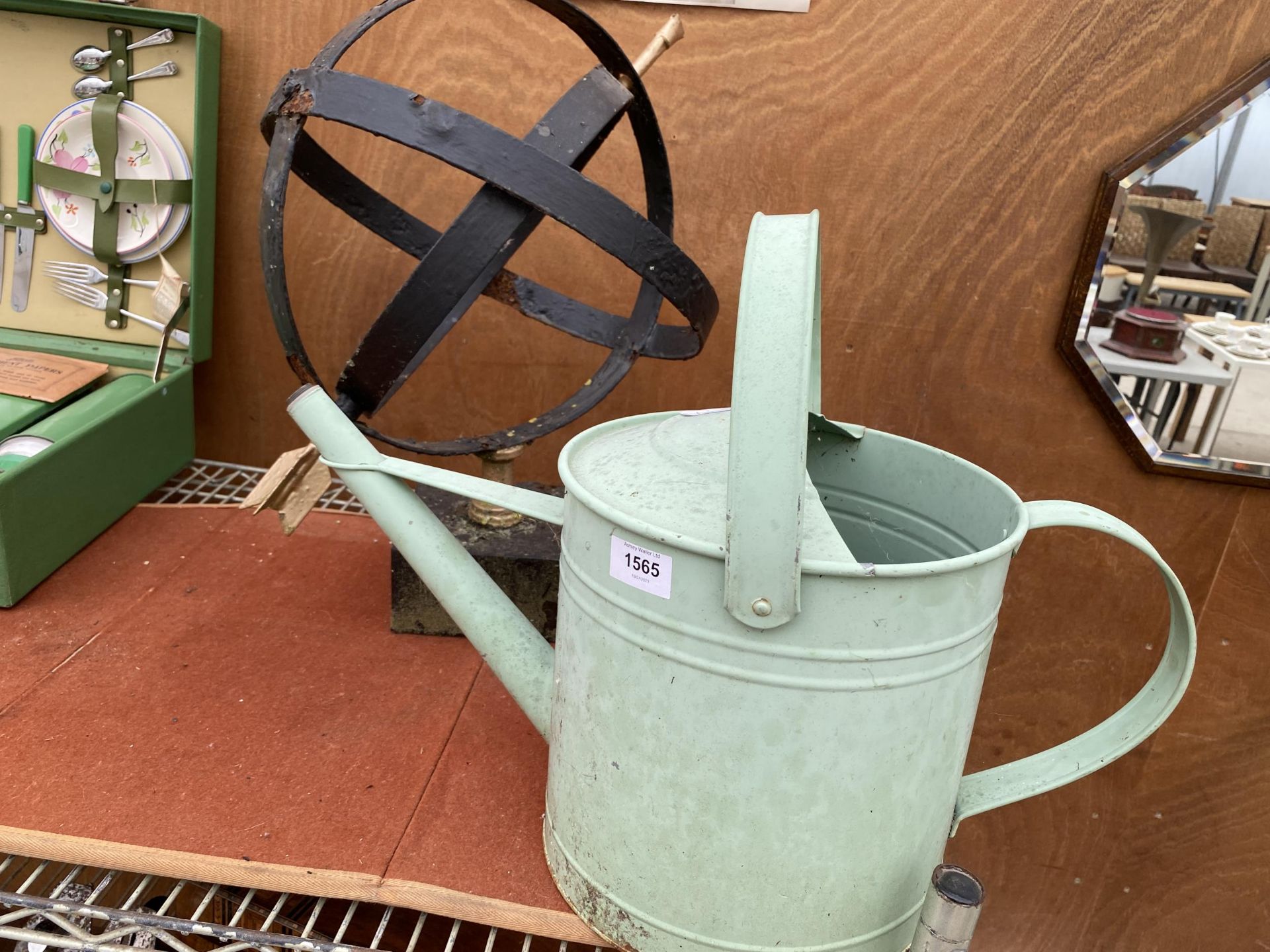 A PAINTED METAL WATERING CAN AND AN ARMILARY SPHERE - Image 2 of 3
