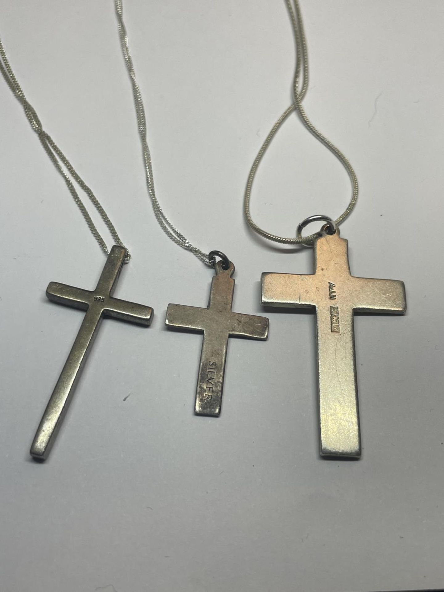 THREE SILVER NECKLACES WITH CROSS PENDANTS - Image 2 of 3