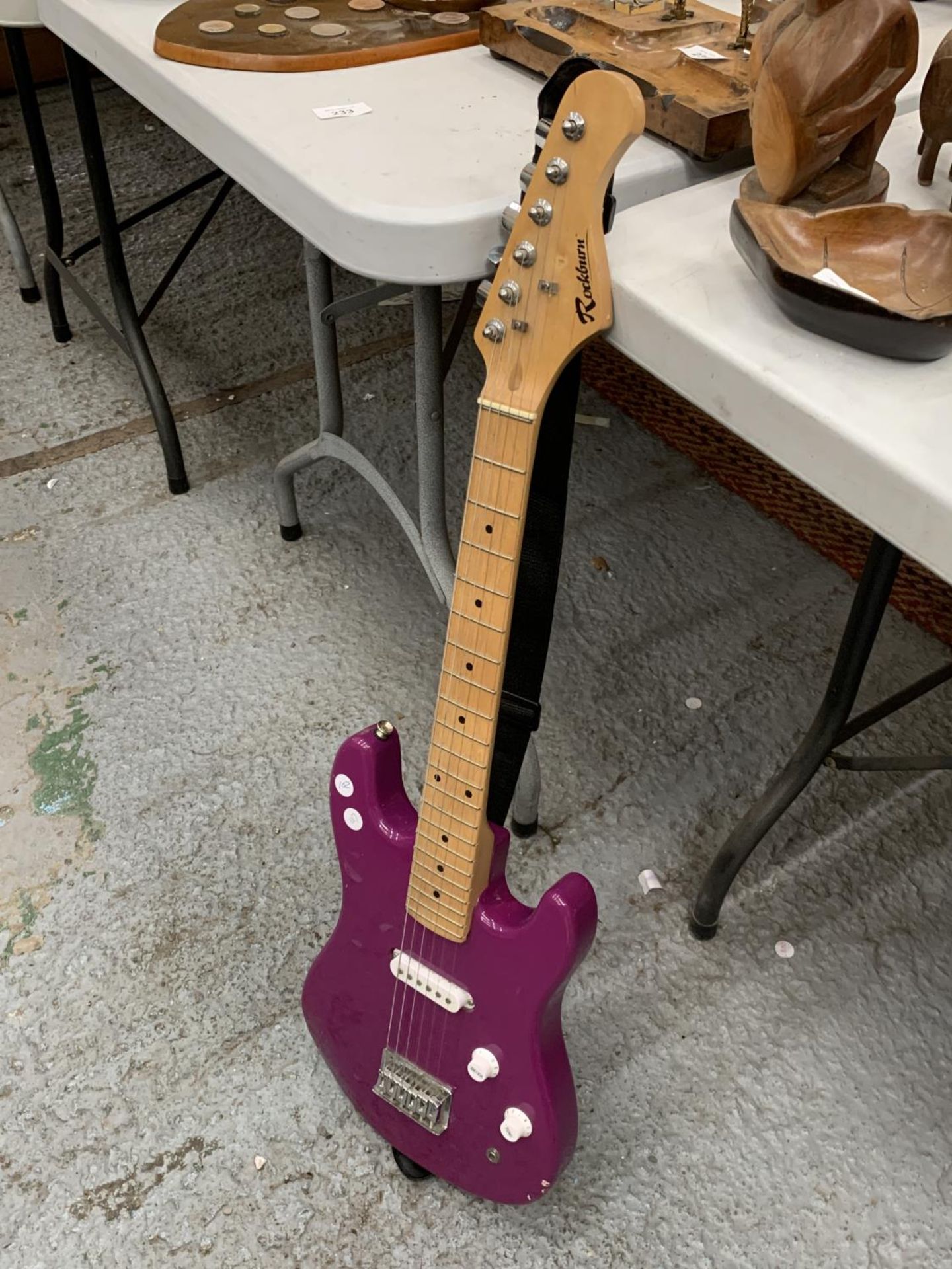 A ROCKBURN PURPLE ELECTRIC GUITAR