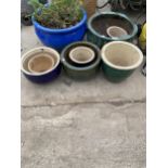 AN ASSORTMENT OF GLAZED PLANTERS TO INCLUDE BLUE AND GREEN EXAMPLES