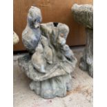 A RECONSTITUTED STONE BIRD DECORATION WATER FEATURE