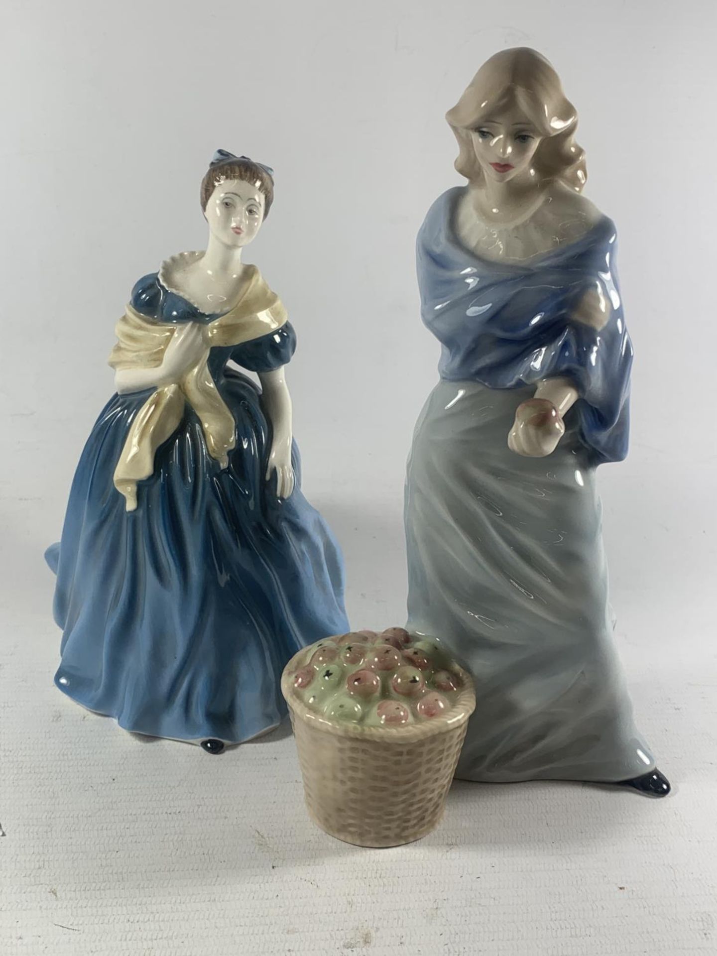 TWO ROYAL DOULTONFIGURES TO INCLUDE REFELCTIONS HARVEST TIME AND ADRIENNE