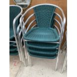 FOUR CHROME AND RATTAN BISTRO STACKING CHAIRS