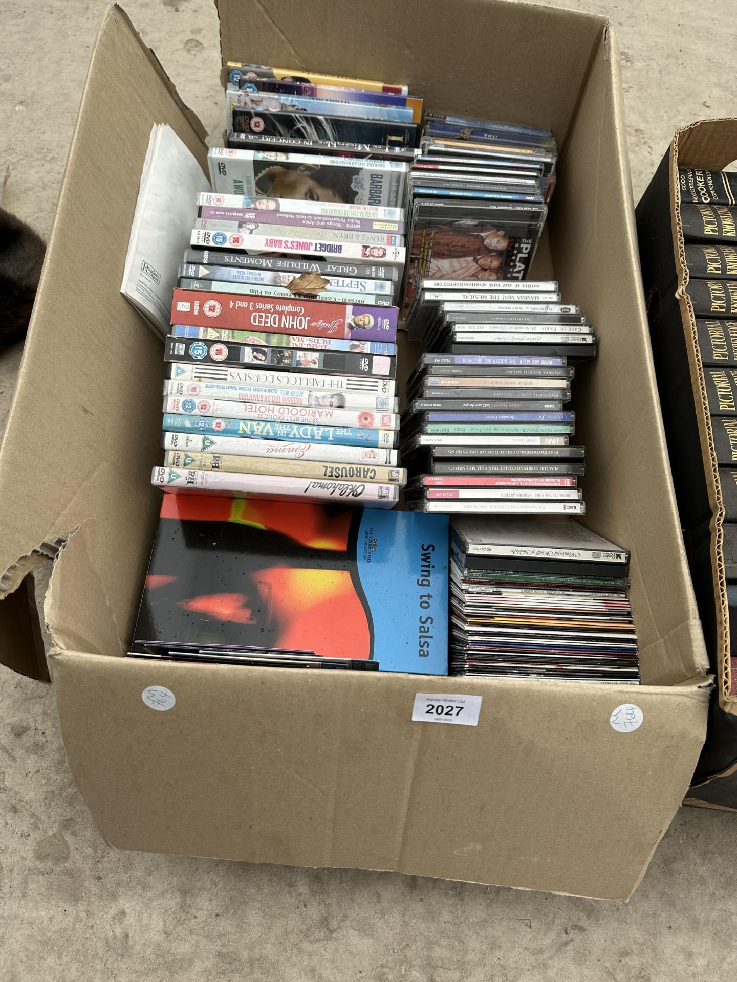 AN ASSORTMENT OF CDS AND DVDS