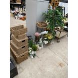 A LARGE ASSORTMENT OF FLORIST ITEMS TO INCLUDE WICKER BASKETS, PLANT STANDS AND ARTIFICIAL PLANTS