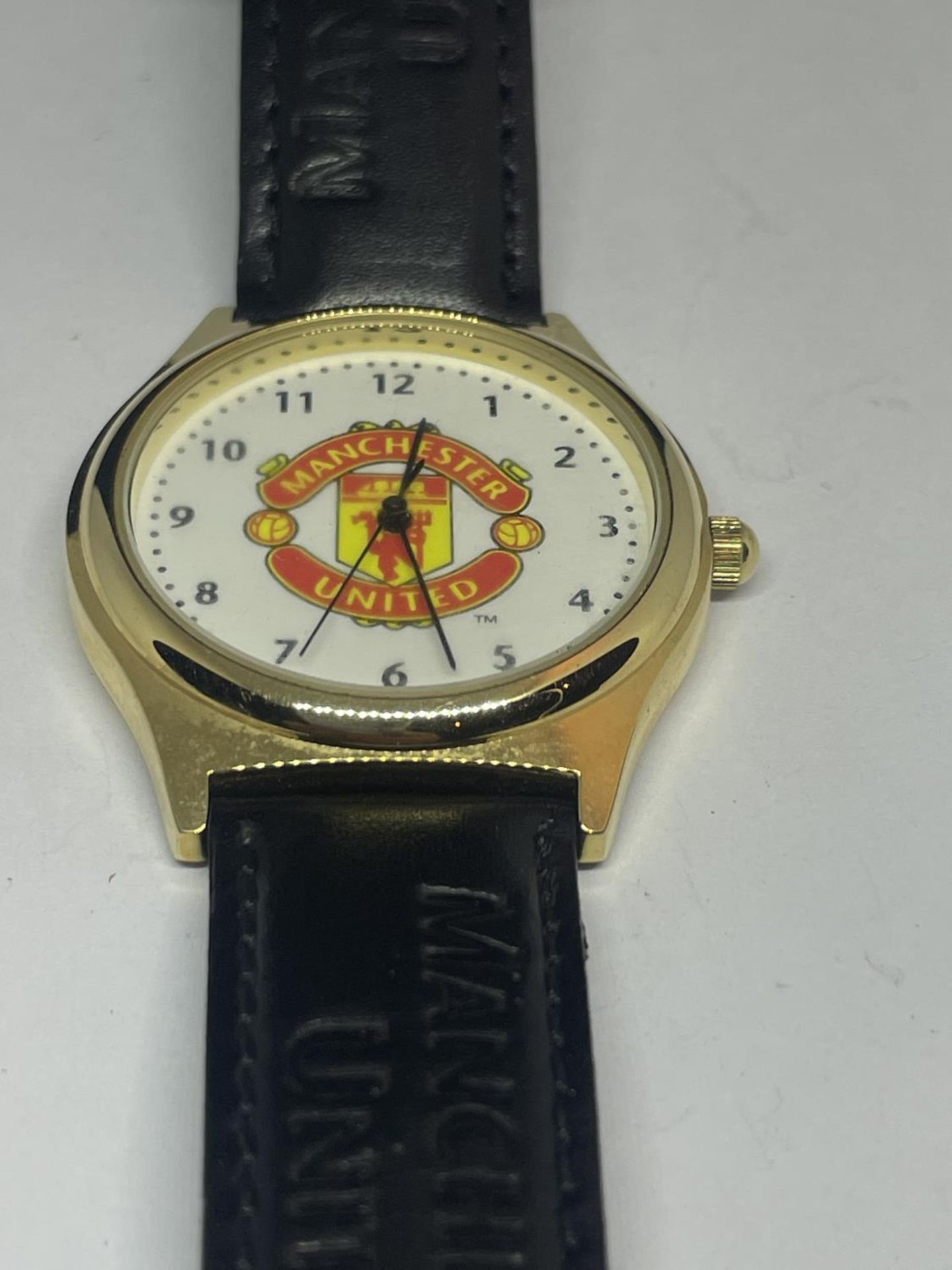 A MANCHESTER UNITED WRIST WATCH SEEN WORKING BUT NO WARRANTY - Image 2 of 3