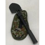 A MILITARY STYLE TRENCH SHOVEL IN A CASE