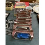 A COLLECTION OF 'CORONATION STREET' ITEMS TO INCLUDE SIX MODEL VEHICLES - BOXED, TWO BOOKS AND A MUG