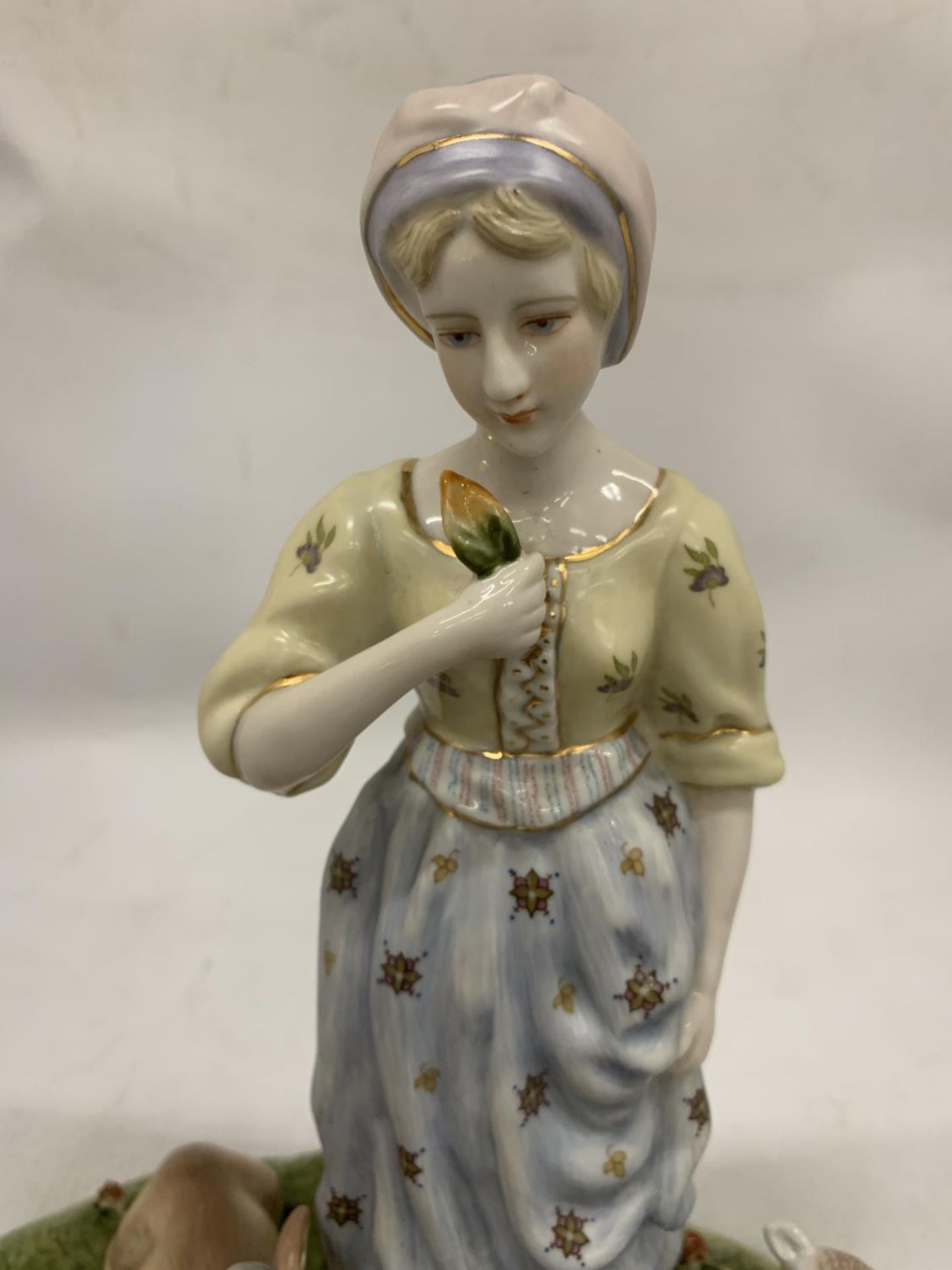 A VINTAGE CERAMIC TABLEAU OF A LADY WITH FARM ANIMALS WITH BLUE CROSSED SWORDS AND R TO BASE - Image 2 of 5