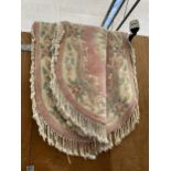 TWO PINK PATTERNED OVAL FRINGED RUGS