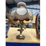 A VINTAGE ORMOLU GILT CHERUB TABLE LAMP AND SHADE