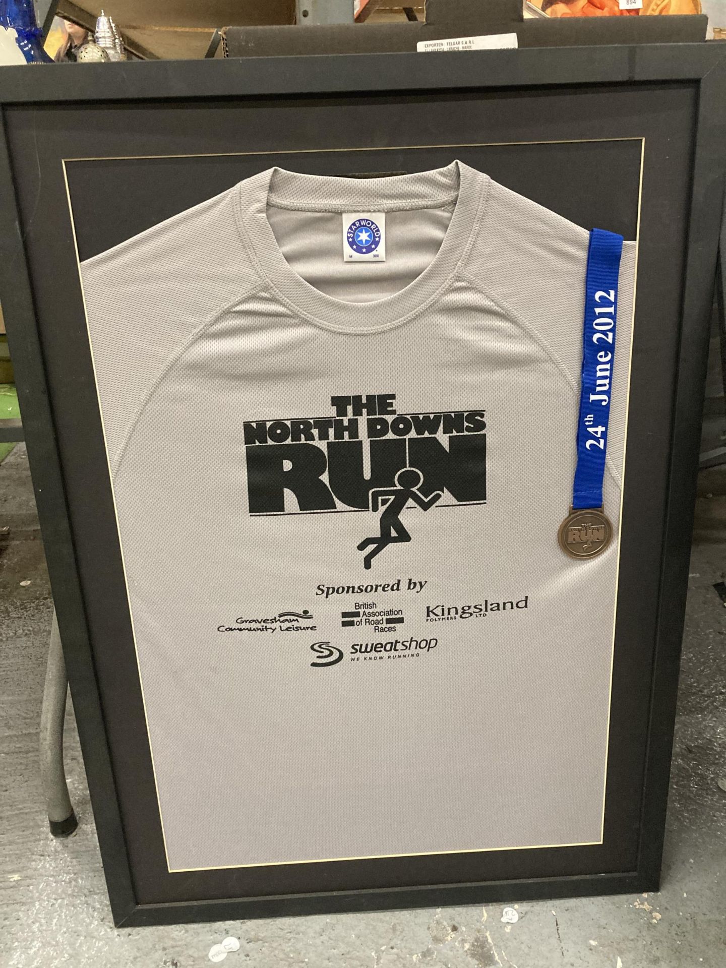 THREE FRAMED AND GLAZED WINNERS SHIRTS AND MEDALS FROM THE NORTH DOWNS RUNS - Image 3 of 4