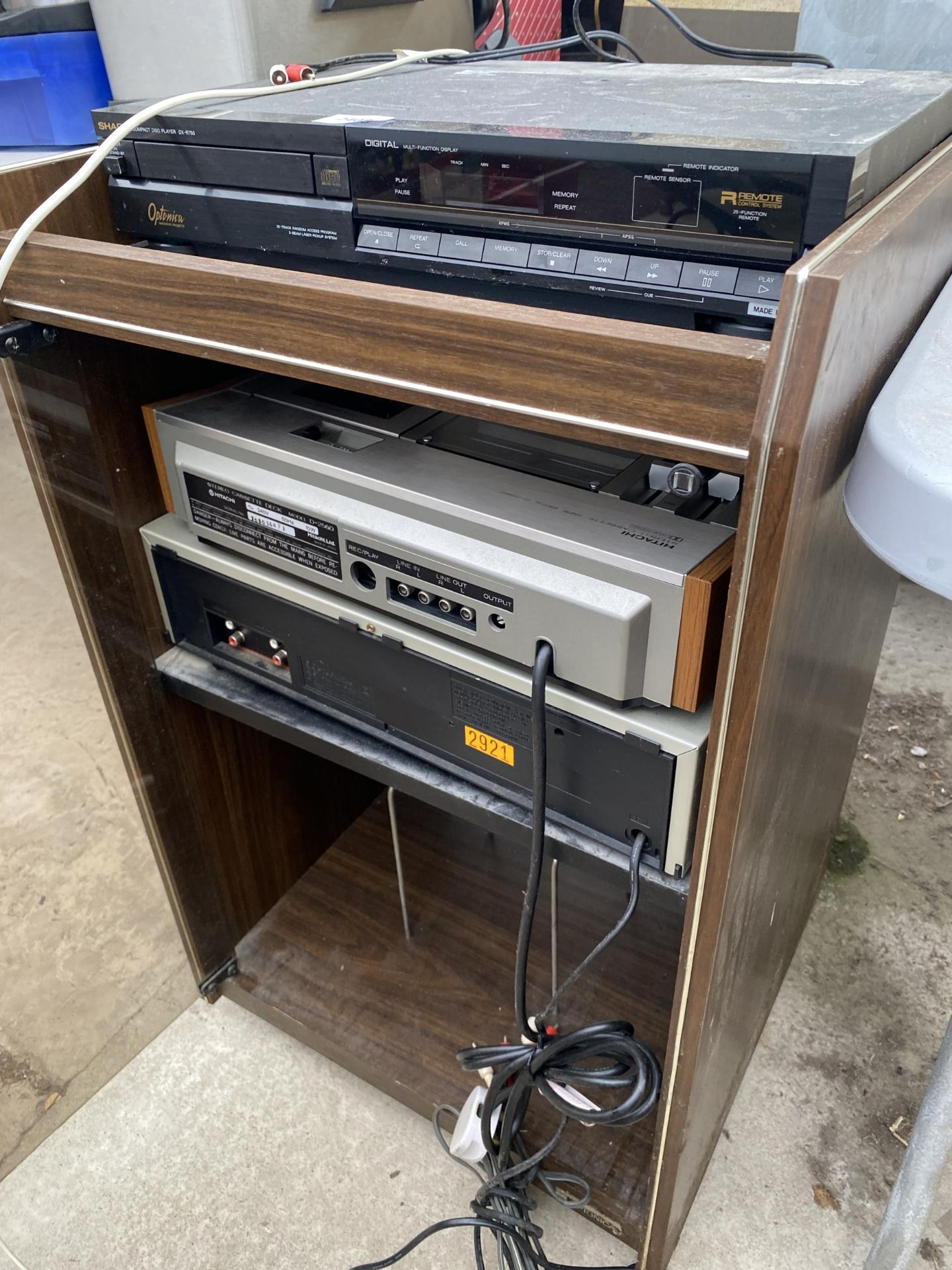 A STEREO CABINET WITH AN ASSORTMENT OF STEREO ITEMS TO INCLUDE A SHARP CD PLAYER AND AN HITACHI - Image 2 of 4
