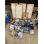 AN ASSORTMENT OF DVDS AND PICTURE FRAMES